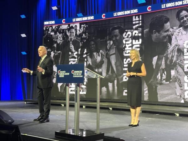 Retired Lt.-Gen. Michel Maisonneuve and his wife retired Maj. Barbara Maisonneuve at the Conservative Party convention at the Centre des congrès de Québec in Quebec City on Sept. 7, 2023. (Omid Ghoreishi/The Epoch Times)