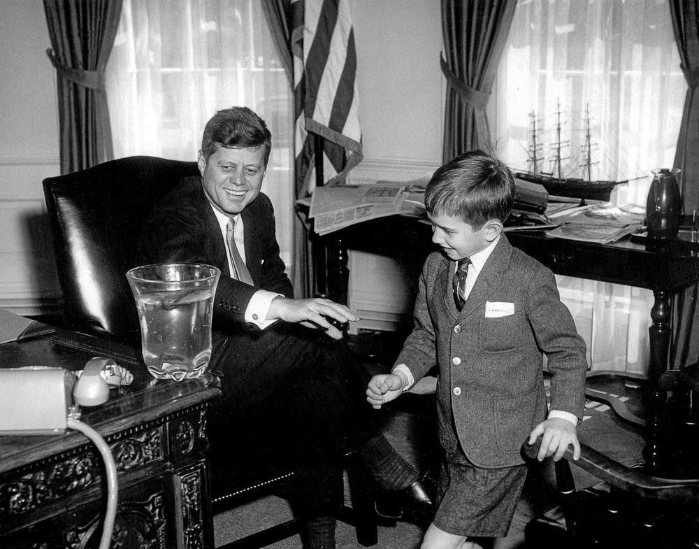 President John F. Kennedy with his nephew Robert F. Kennedy Jr. in the Oval Office of the White House on March 11, 1961. (Abbie Rowe. White House Photographs. John F. Kennedy Presidential Library and Museum, Boston)