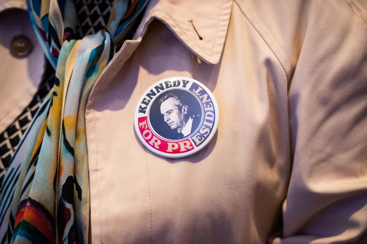 A supporter of Robert F. Kennedy Jr. awaits his 2024 presidential bid announcement in Boston on April 19, 2023. (Joseph Prezioso/AFP via Getty Images)