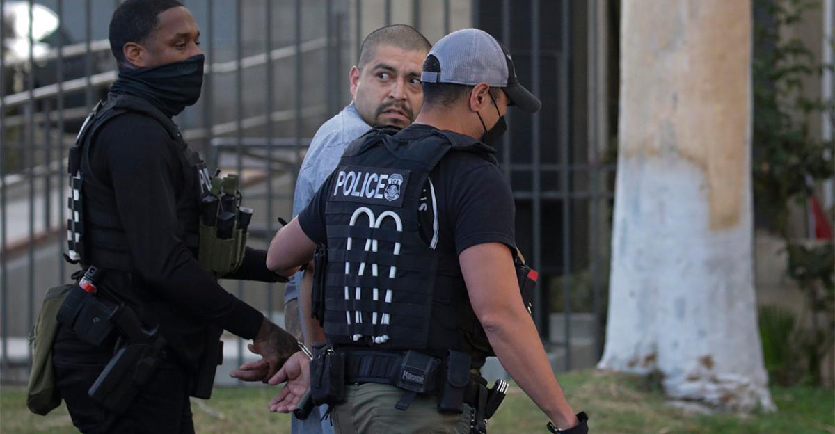Immigration and Customs Enforcement (ICE) agents apprehended an illegal alien with a criminal record in an early morning raid at home, in Los Angeles, Calif., on Sept. 8, 2022. (Irfan Khan, Los Angeles Times/Getty Images)