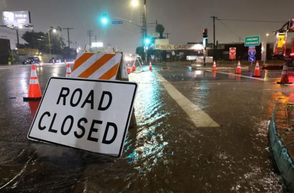 An entrance to southbound Interstate 5 is blocked due to flooding as tropical storm Hilary moves through the area in Sun Valley, Calif., on Aug. 20, 2023. (Justin Sullivan/Getty Images)