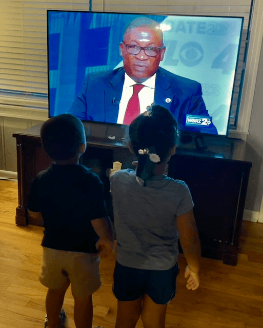 Democrat Louisiana gubernatorial candidate Shawn Wilson posted this photo of two of his grandchildren watching him in the Sept. 7 debate. (Courtesy of Shawn Wilson For Governor)
