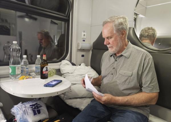 Producer Duncan Scott on the train to screen "We the Living" in Kyiv. (Courtesy of Barbara Scott)