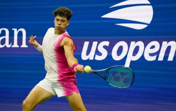 USA's Ben Shelton returns the ball to Serbia's Novak Djokovic during the US Open tennis tournament men's singles semi-finals match at the USTA National Tennis Center in New York City, on Sept. 8, 2023. (Timothy A. Clary/AFP via Getty Images)