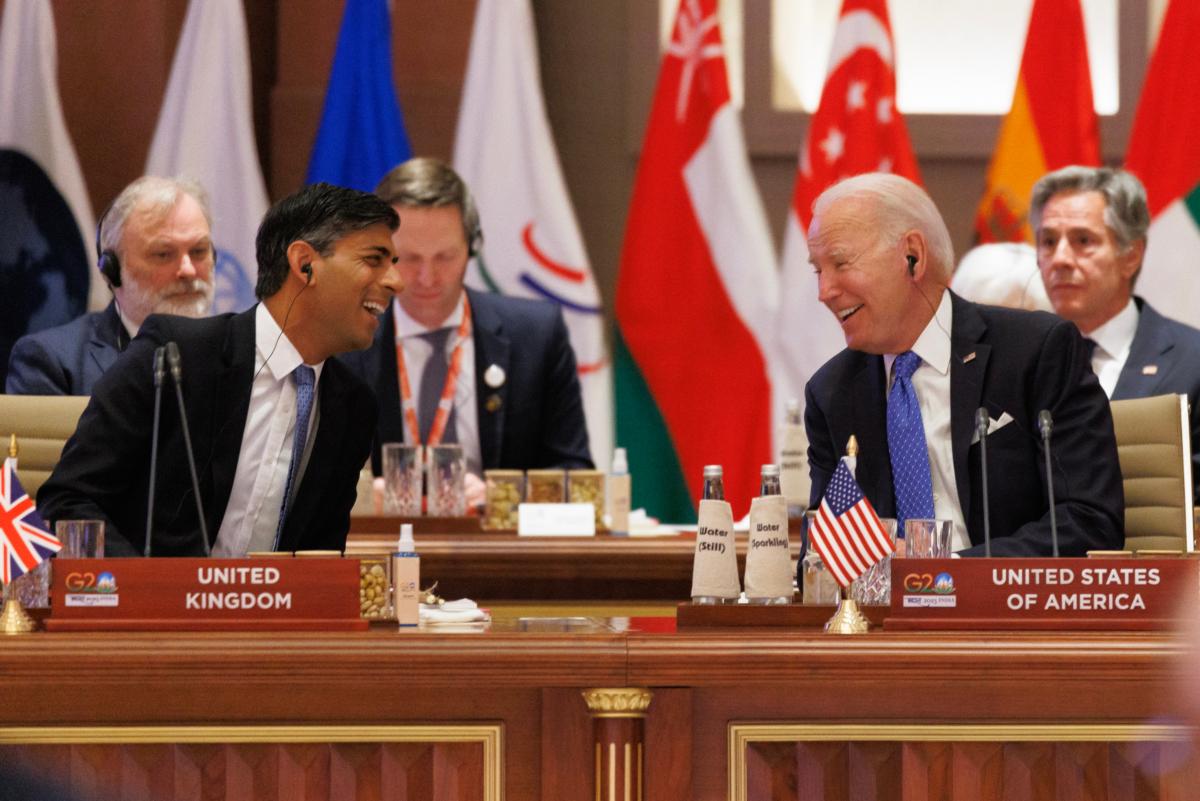 British Prime Minister Rishi Sunak speaks to U.S. President Joe Biden during the G20 Leaders' Summit in New Delhi, on Sept. 9, 2023. (Dan Kitwood/Getty Images)