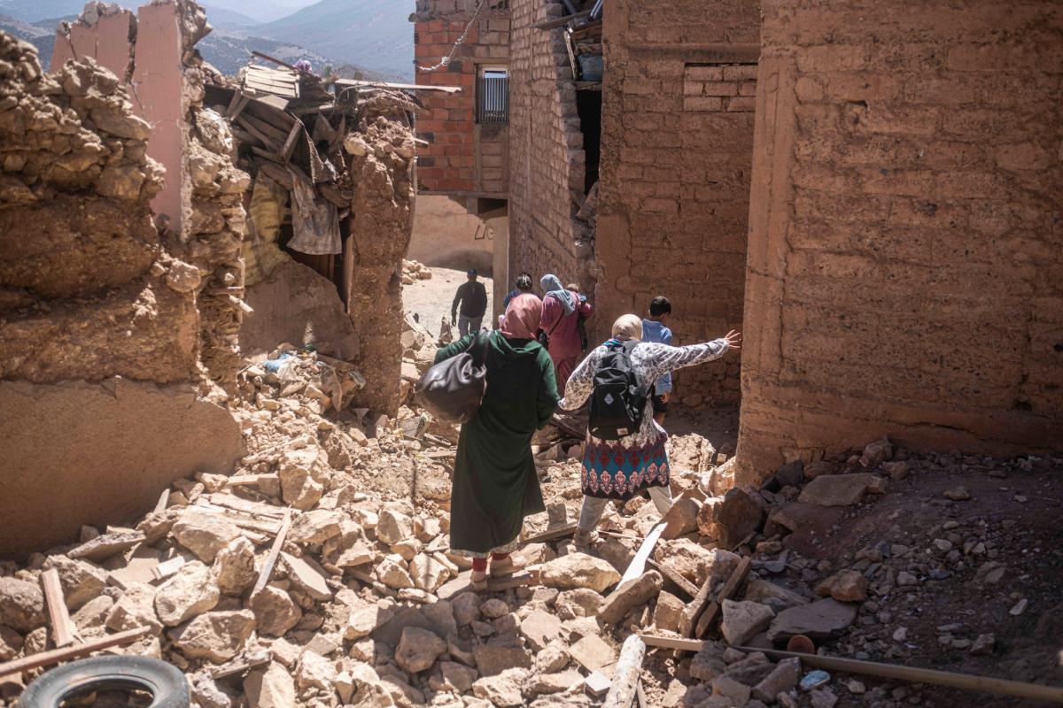 Residents flee their homes after an earthquake in Moulay Brahim village, near the epicenter of the earthquake, in Morocco on Sept. 9, 2023. (Mosa'ab Elshamy/AP Photo)