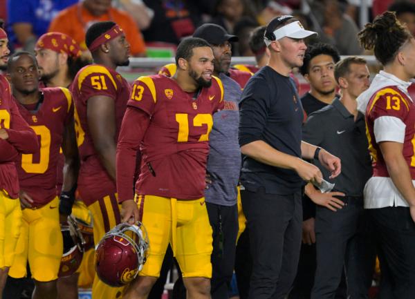 Quarterback Caleb Williams (13) stands with head coach Lincoln Riley of the USC Trojans on the sidelines in the second half against the Stanford Cardinal at United Airlines Field at the Los Angeles Memorial Coliseum in Los Angeles on Sept. 9, 2023. (Jayne Kamin-Oncea/Getty Images)