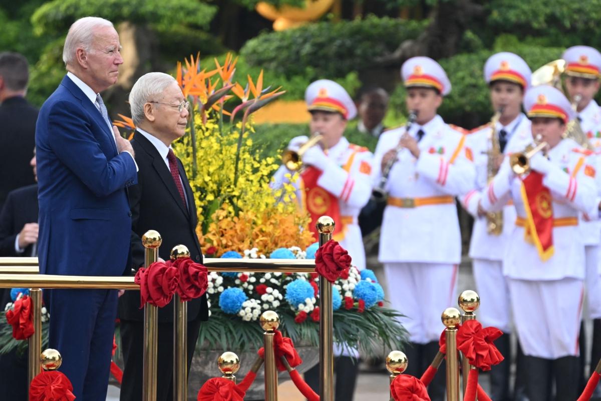 U.S. President Joe Biden attends a welcoming ceremony hosted by Vietnam's Communist Party General Secretary Nguyen Phu Trong (2L) at the Presidential Palace of Vietnam in Hanoi on Sept. 10, 2023. (Saul Loeb/AFP via Getty Images)