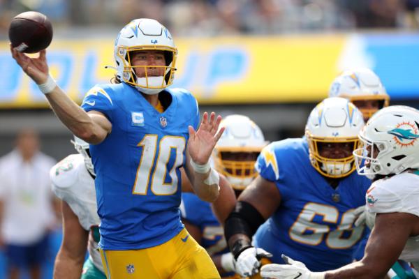 Justin Herbert (10) of the Los Angeles Chargers throws a pass in the third quarter of a game against the Miami Dolphins at SoFi Stadium in Inglewood, Calif., on Sept. 10, 2023. (Harry How/Getty Images)