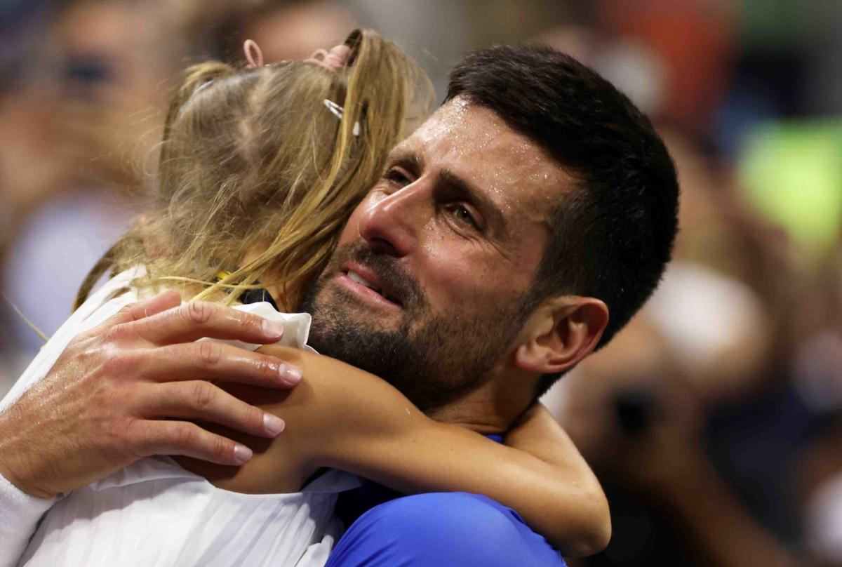 Novak Djokovic of Serbia celebrates with daughter Tara Djokovic after defeating Daniil Medvedev of Russia during their Men's Singles Final match on Day Fourteen of the 2023 U.S. Open at the USTA Billie Jean King National Tennis Center, in the Flushing neighborhood of the Queens borough of New York City, on Sept. 10, 2023. (Clive Brunskill/Getty Images)