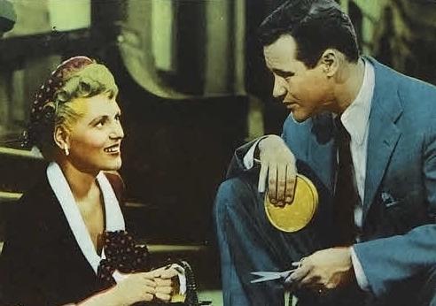 A cropped lobby card with Judy Holliday and Jack Lemmon starring in "It Should Happen to You." (MovieStillsDB)