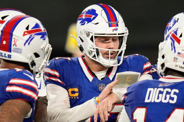 Buffalo Bills quarterback Josh Allen (center) calls a play in the huddle during the third quarter of an NFL football game against the New York Jets in East Rutherford, N.J., on Sept. 11, 2023. (Seth Wenig/AP Photo)