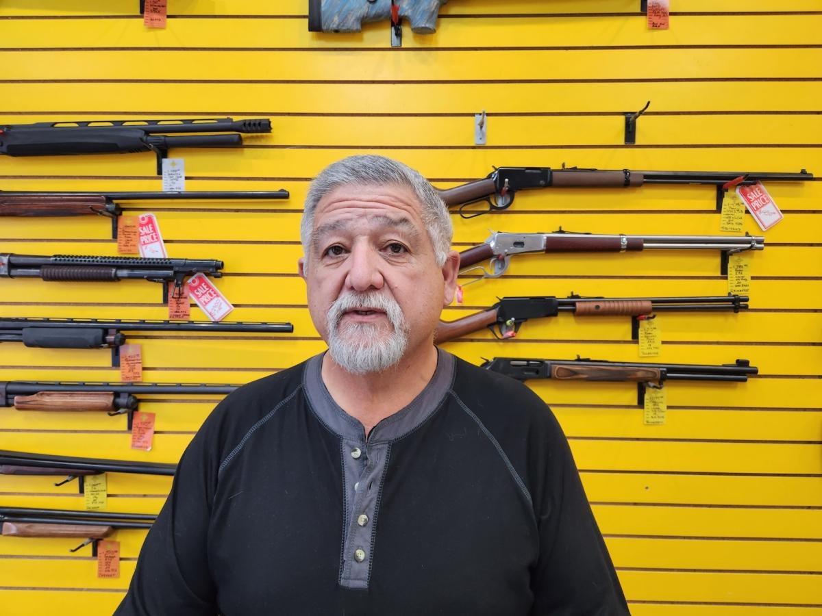  Arnold Gallegos, owner of ABQ Guns in Albuquerque, N.M., and a police officer in the Jemez Springs Police Department, considers a public health order banning firearms in public an "illegal" act by New Mexico's governor. Photo taken on Sept. 12, 2023. (Allan Stein/The Epoch Times)