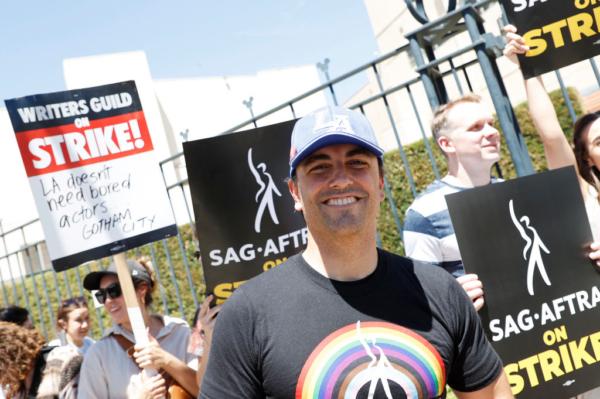 Mayor of Burbank, Konstantine Anthony, walks a picket line alongside members of the Writers Guild of America and the Screen Actors Guild outside Disney Studios in Burbank, Calif., on July 14, 2023. (Michael Tran/AFP via Getty Images)
