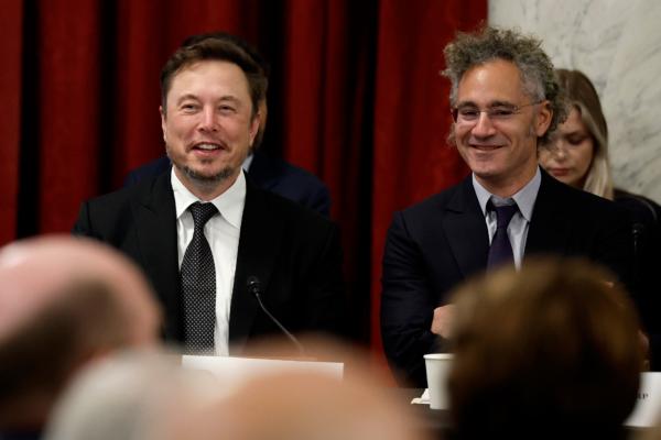 X/Tesla CEO Elon Musk (L) and Palantir CEO Alex Karp attend the "AI Insight Forum" in the Kennedy Caucus Room in the Russell Senate Office Building on Capitol Hill in Washington, on Sept. 13, 2023. (Chip Somodevilla/Getty Images)