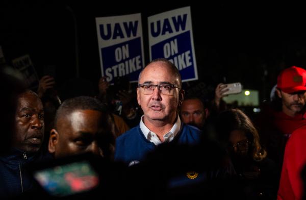 United Auto Workers (UAW) president Shawn Fain speaks with members of the media and members of the UAW outside of the UAW Local 900 headquarters across the street from the Ford Assembly Plant in Wayne, Mich., on Sept. 15, 2023. (Matthew Hatcher/AFP via Getty Images)