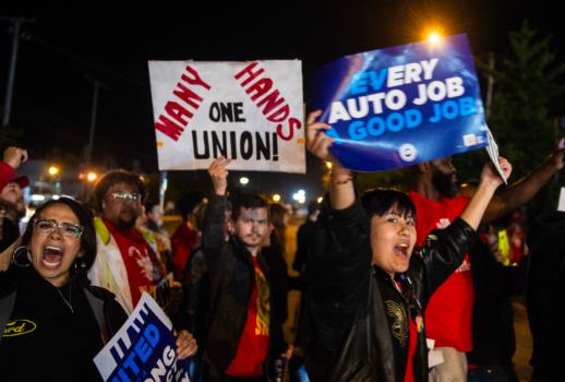 Members of the United Auto Workers picket and hold signs outside of the UAW Local 900 headquarters across the street from the Ford Assembly Plant in Wayne, Mich. on Sept. 15, 2023. (Matthew Hatcher/AFP via Getty Images)