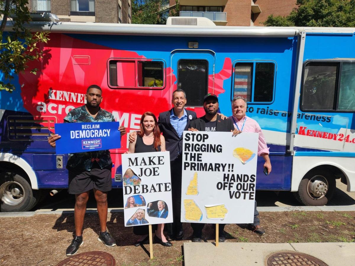 Mark Gorton (C), co-chairman of the pro-RFK Jr. American Values 2024 Super PAC, joins RFK Jr. supporters outside the DNC Rules and Bylaws Committee meeting in Washington on Sept. 14. (Jeff Louderback/The Epoch Times)