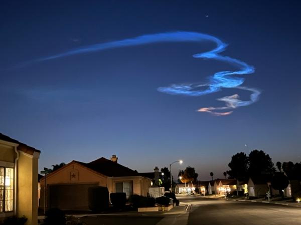 A trail left by a rocket launching from the Vandenburg Space Force Base in Santa Barbara County as seen from a neighborhood in Menifee, Calif., on Sept. 14, 2023. (Brad Jones/The Epoch Times)