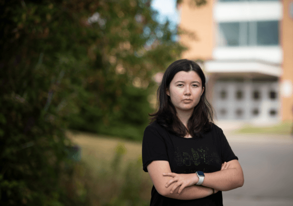 Reina Takata, a grade 10 student affected by Peel District School Board’s book-weeding, poses for a photograph in Mississauga, Ont., on Sept. 14, 2023. (Tijana Martin/The Canadian Press)