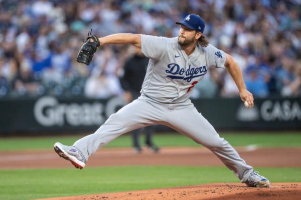 Starting pitcher Clayton Kershaw (21) of the Los Angeles Dodgers delivers a pitch during the first inning of a game against the Seattle Mariners at T-Mobile Park in Seattle on Sept. 16, 2023. (Stephen Brashear/Getty Images)