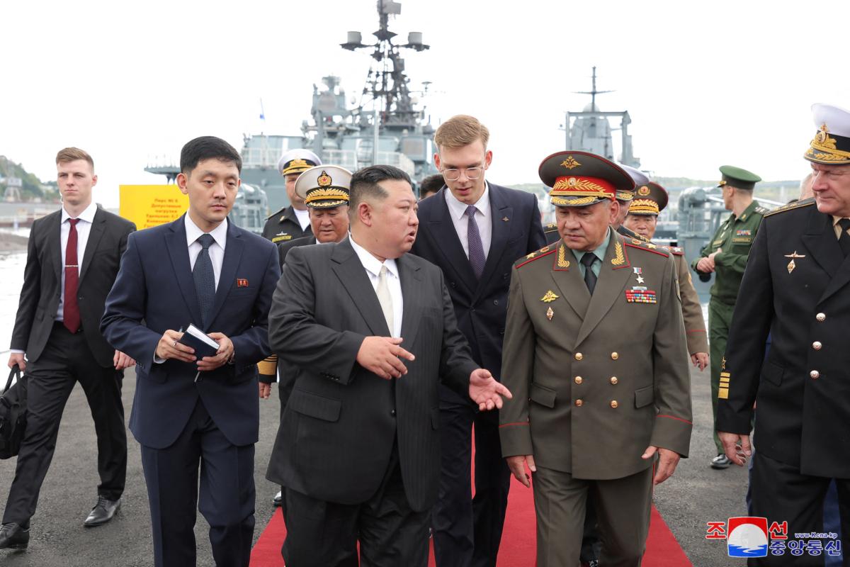 North Korean leader Kim Jong Un walks with Russia's Defence Minister Sergei Shoigu, as he visits Vladivostok, Russia, September 16, 2023 released by the Korean Central News Agency on Sept. 17, 2023. (KCNA via Reuters)