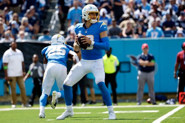 Justin Herbert (10) of the Los Angeles Chargers attempts a pass during the third quarter against the Tennessee Titans at Nissan Stadium in Nashville on Sept.17, 2023. (Johnnie Izquierdo/Getty Images)
