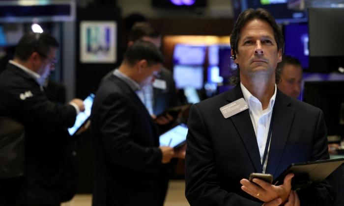 Wall Street Opens Lower as Hawkish Fed Lifts Yields, Growth Stocks Fall