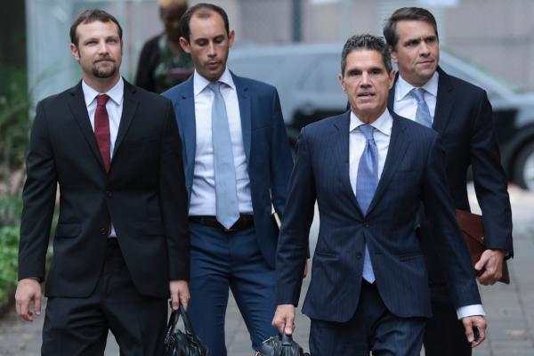 Attorneys for former President Donald Trump Todd Blanche (R), John Lauro (2nd R) and Gregory Singer (L) arrive at the E. Barrett Prettyman U.S. Court House in Washington on Aug. 28, 2023. Blanche, Lauro, and Singer attended a status hearing held by U.S. District Judge Tanya Chutkan in the case against Trump. (Photo by Win McNamee/Getty Images)