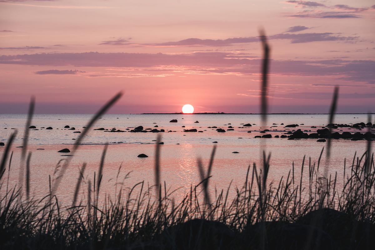 The sun sets over the island of Kihnu. (Priidu Saart/Visit Estonia)