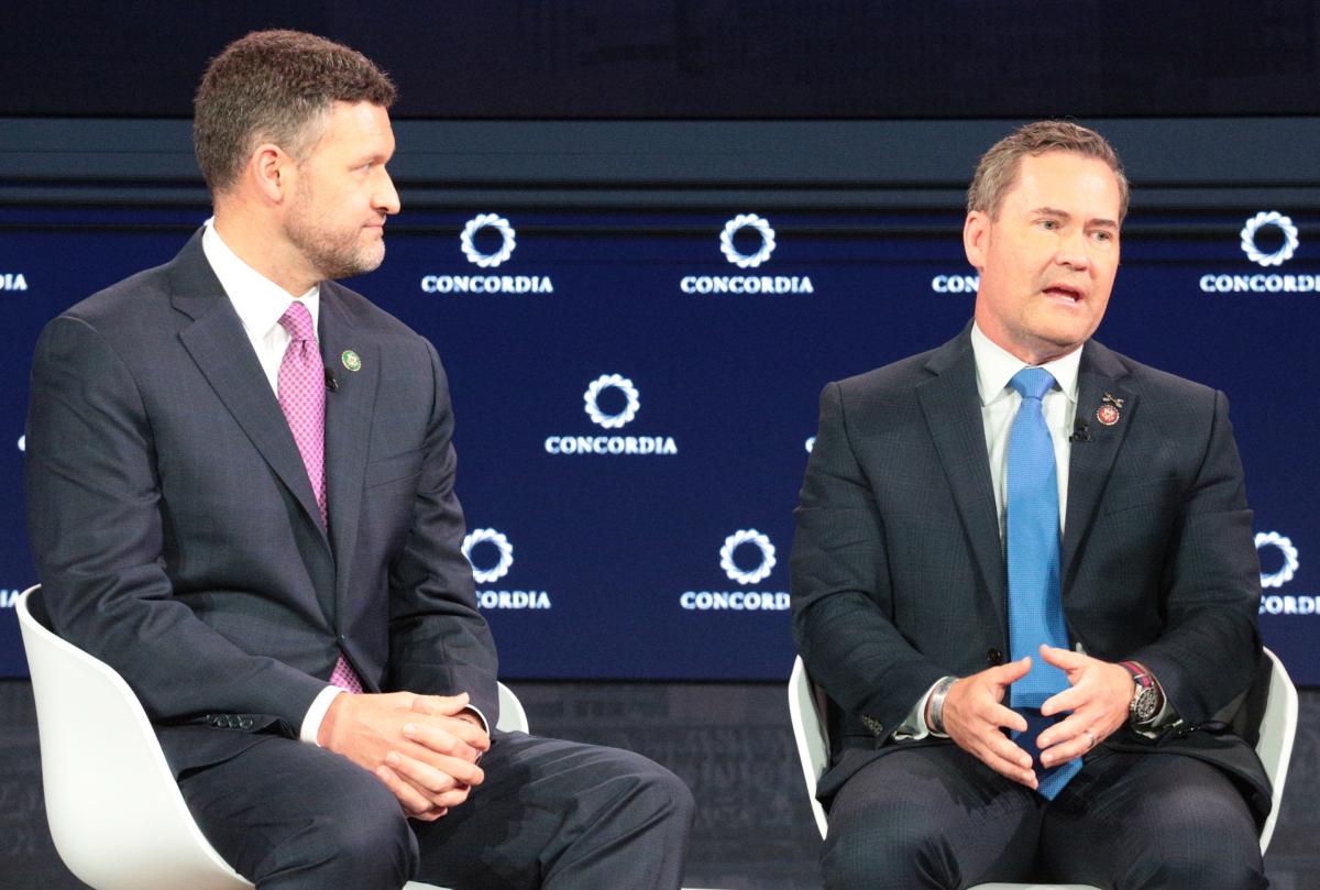 Rep. Pat Ryan (D-N.Y.) (L) and Rep. Mike Waltz (D-N.Y.)(R) during an interview at the Concordia Annual Summit in New York, on Sept. 18, 2023. (Richard Moore/The Epoch Times)