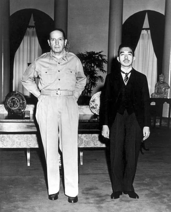 Gen. MacArthur and the Emperor at Allied General Headquarters in Tokyo, Sept. 27, 1945, by Gaetano Faillace. (Public Domain)