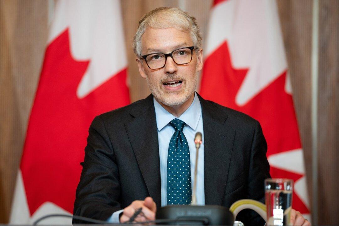 Canada Post Breaking Law by Gathering Info From Envelopes, Parcels: Watchdog