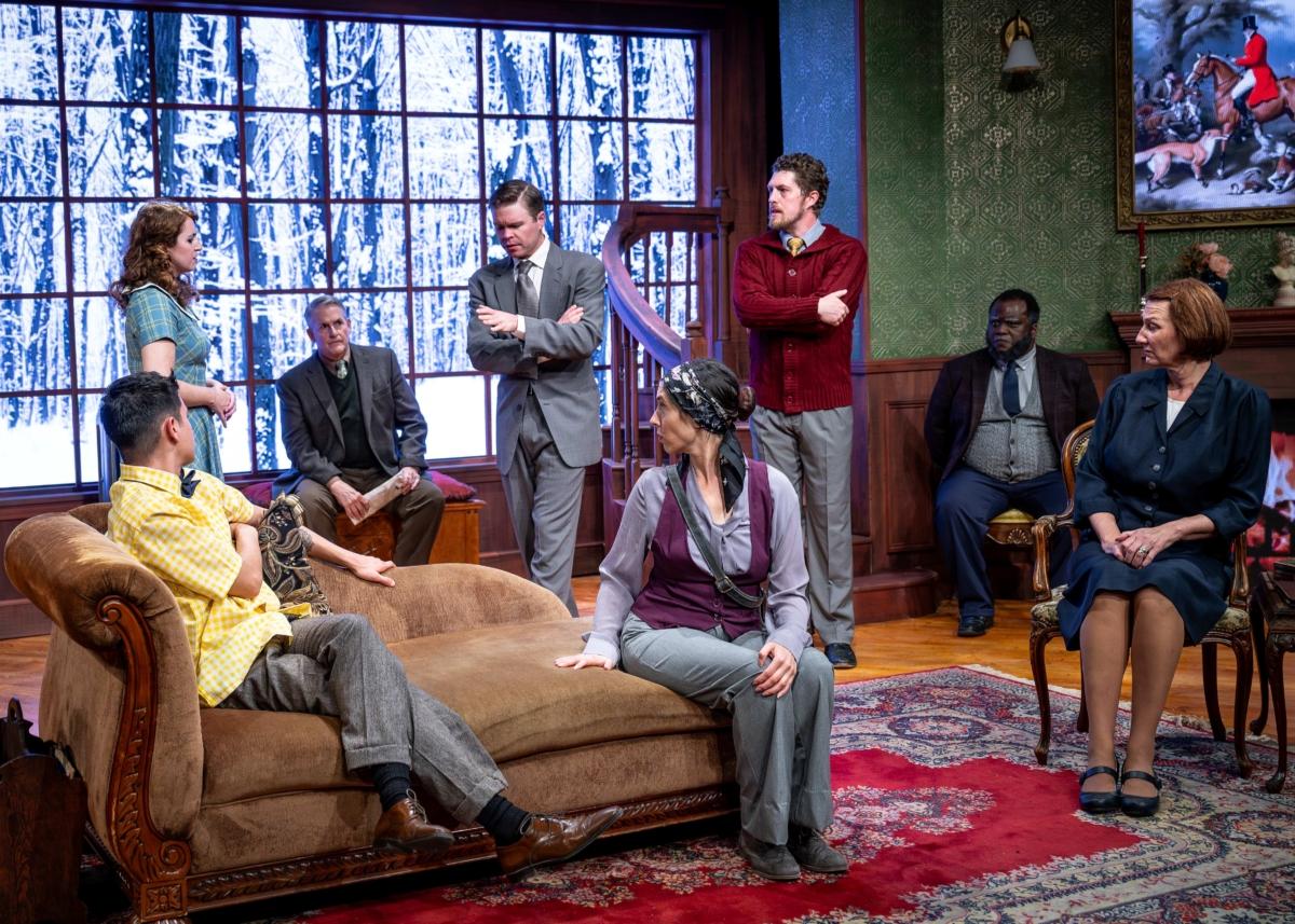 (L–R) Christopher Wren (Jesús Barajas), Mollie Ralston (Mary Margaret McCormack), Maj. Metcalf (William Ryder), Detective Sgt. Trotter (Sean Erik Wesslund), Miss Casewell (Amy Stricker), Giles Ralston (Jack Sharkey), Mr. Paravicinio (Reginald Hemphill), and Mrs. Boyle (Kristie Berger), in the Citadel Theatre production of "The Mousetrap.“ (North Shore Camera Club)