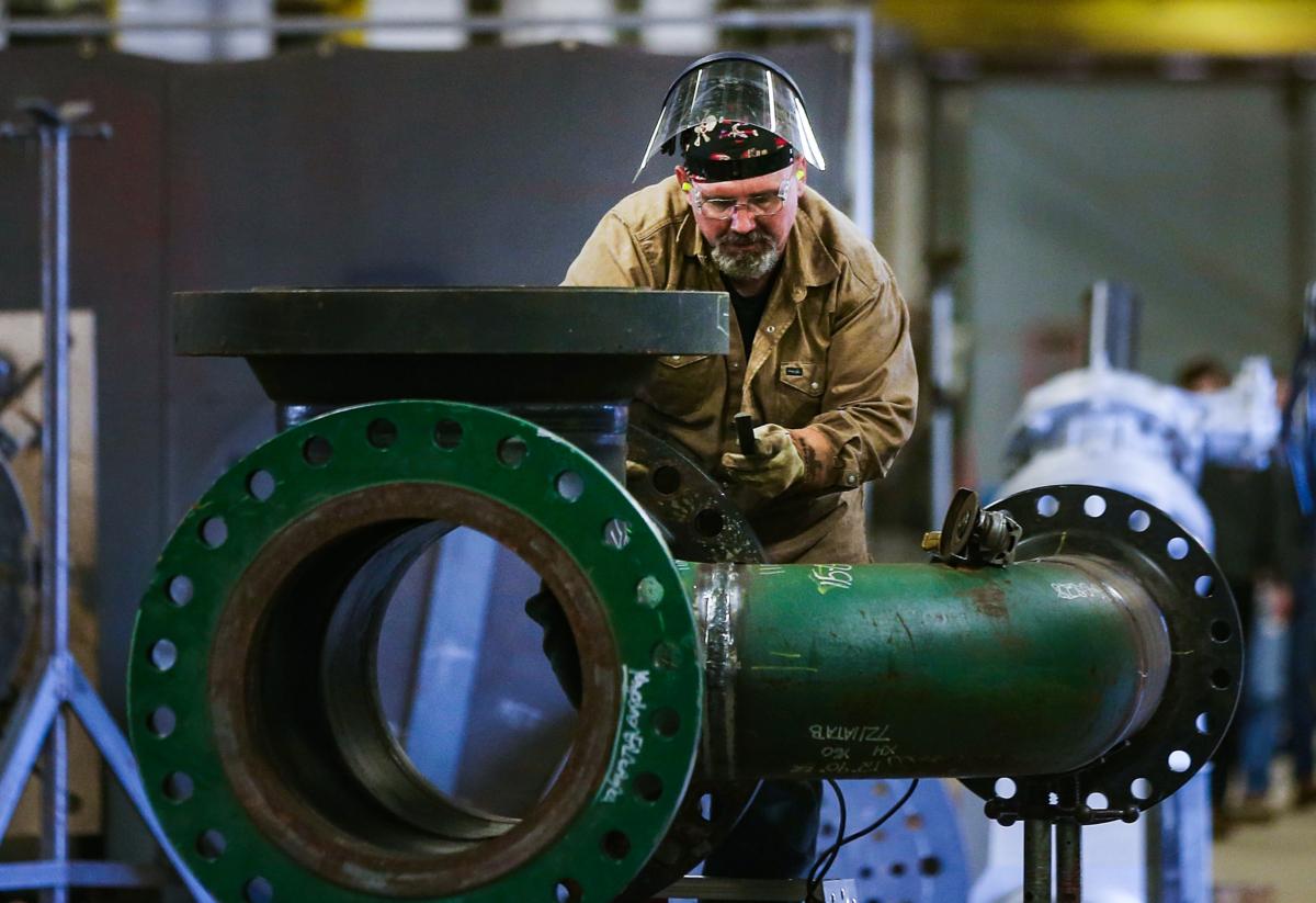 A worker works on a pipe at Pioneer Pipe, which supplies products to the oil and gas industry, in Marietta, Ohio, on Oct. 25, 2016. (Spencer Platt/Getty Images)
