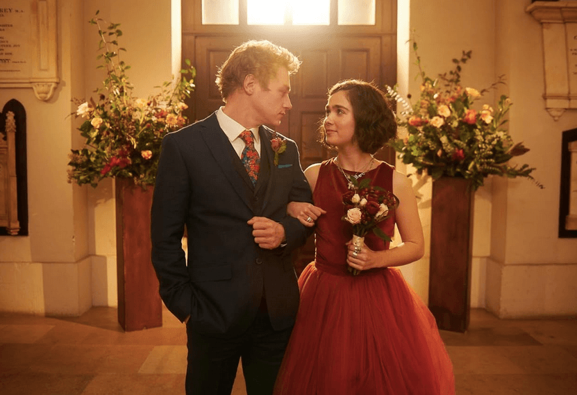  Oliver Jones (Ben Hardy) and Hadley Sullivan (Haley Lu Richardson) attend her dad's wedding reception, in "Love at First Sight." (Rob Baker Ashton/Netflix)