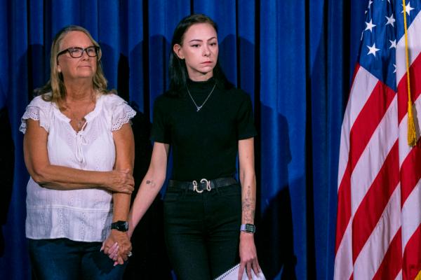  Crystal Probst, left, and her daughter, Taylor Probst, family members of Andreas Rene Probst, a cyclist who was intentionally struck in a series of hit-and-run crashes, wait to speak at a news conference on Tuesday, Sept. 19, 2023, in Las Vegas. (AP Photo/Ty ONeil)