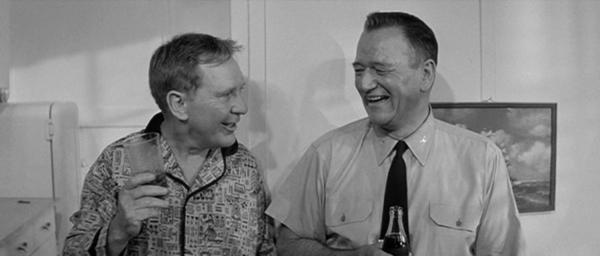  Comd. Egan Powell (Burgess Meredith, L) and U.S. Navy Capt. Rockwell "Rock" Torrey (John Wayne), in "In Harms Way." (Paramount Pictures)