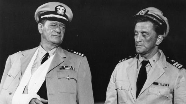  U.S. Navy Capt. Rockwell "Rock" Torrey (John Wayne, L) and Comd. Paul Eddington (Kirk Douglas), in "In Harms Way." (Paramount Pictures)