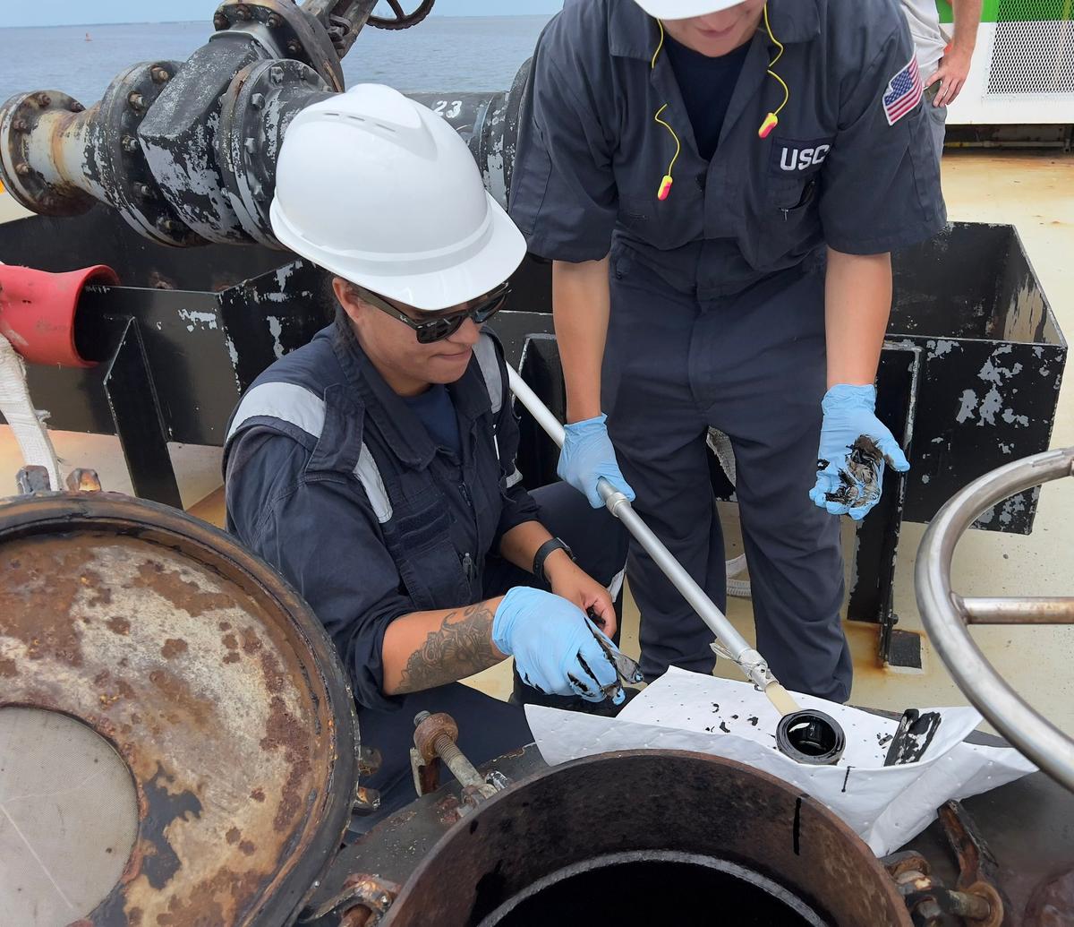 Coast Guard officials perform type-testing on oil samples found at SeaPort Manatee on Sept. 7, 2023. (Courtesy of United States Coast Guard)