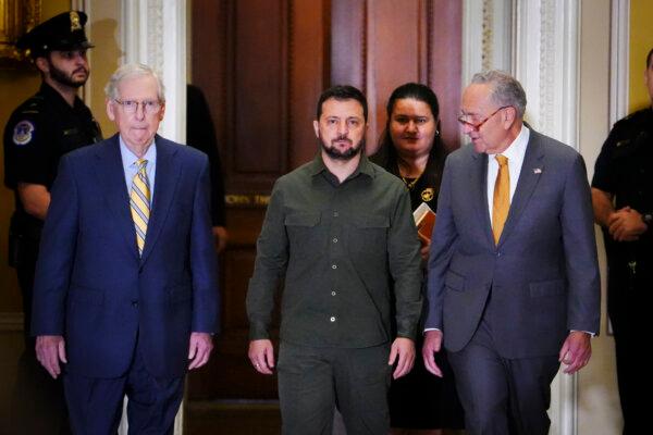 Sen. Mitch McConnell (R-Ky.) (L), Ukrainian President Volodymyr Zelenskyy (C), and Sen. Charles Schumer (D-N.Y.) (R) walk to meet with the Speaker of the House and other lawmakers in Congress in Washington on Sept. 21, 2023. (Madalina Vasiliu/The Epoch Times)