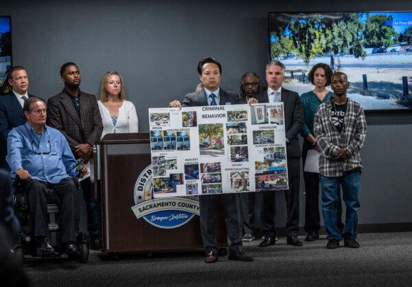 Sacramento County District Attorney Thien Ho announces that his office is suing the City of Sacramento for creating a public nuisance by failing to take stronger action on homeless camps, in Sacramento, Calif., on Sept. 19, 2023. (Hector Amezcua/The Sacramento Bee via AP)