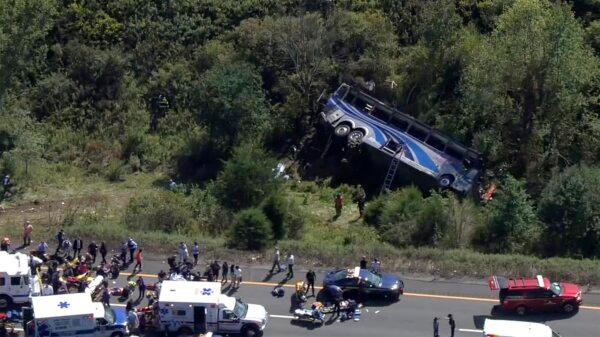 Emergency responders work at the scene of a fatal bus crash in Wawayanda, N.Y., on Sept. 21, 2023. (NBC New York via AP)