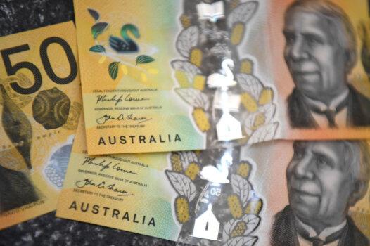 This photo illustration shows three Australian banknotes taken in Melbourne, Australia, on Oct. 12, 2020. (William West/AFP via Getty Images)