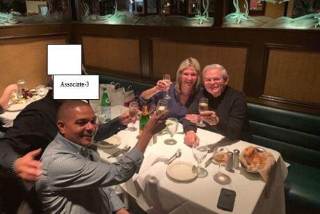  Sen. Menendez, his wife, and one of the businessmen who allegedly bribed him at a dinner in 2019. (DOJ via The Epoch Times)