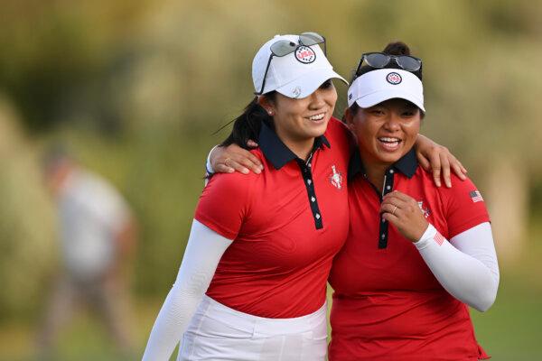  Rose Zhang and Megan Khang of Team USA hug during Day One of The Solheim Cup at Finca Cortesin Golf Club in Casares, Spain, on Sept. 22, 2023. (Stuart Franklin/Getty Images)
