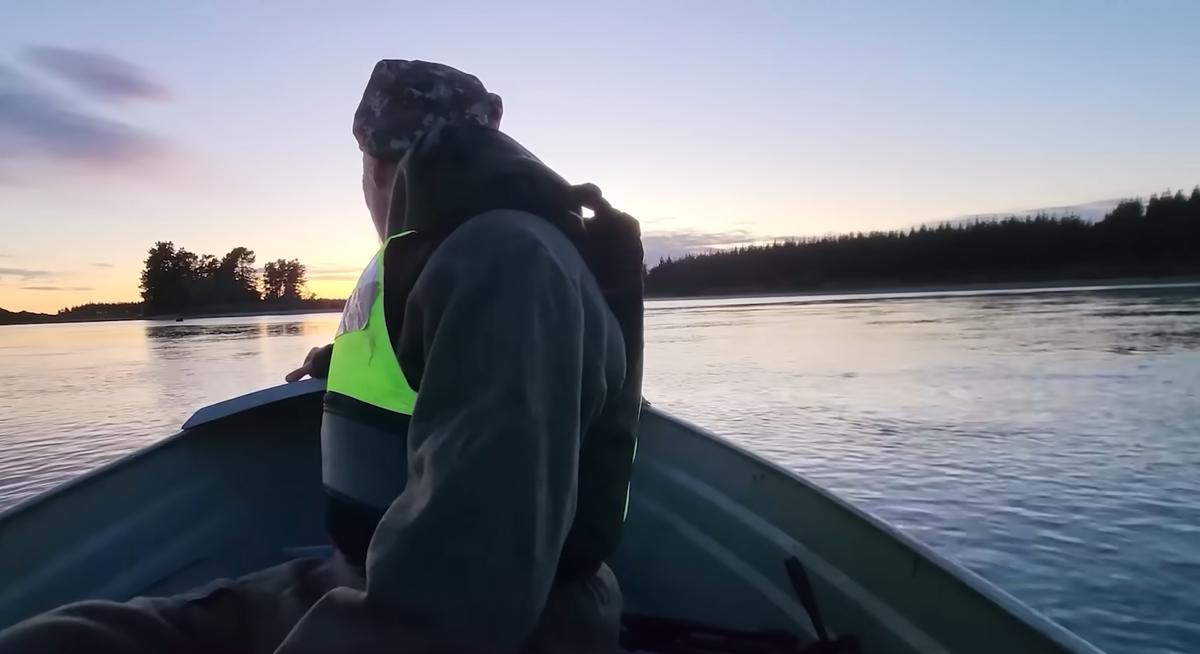 Clay rides a boat through a channel along Tasman Bay and reaches "Crazy Horse Island." (Courtesy of Clay Tall Stories)