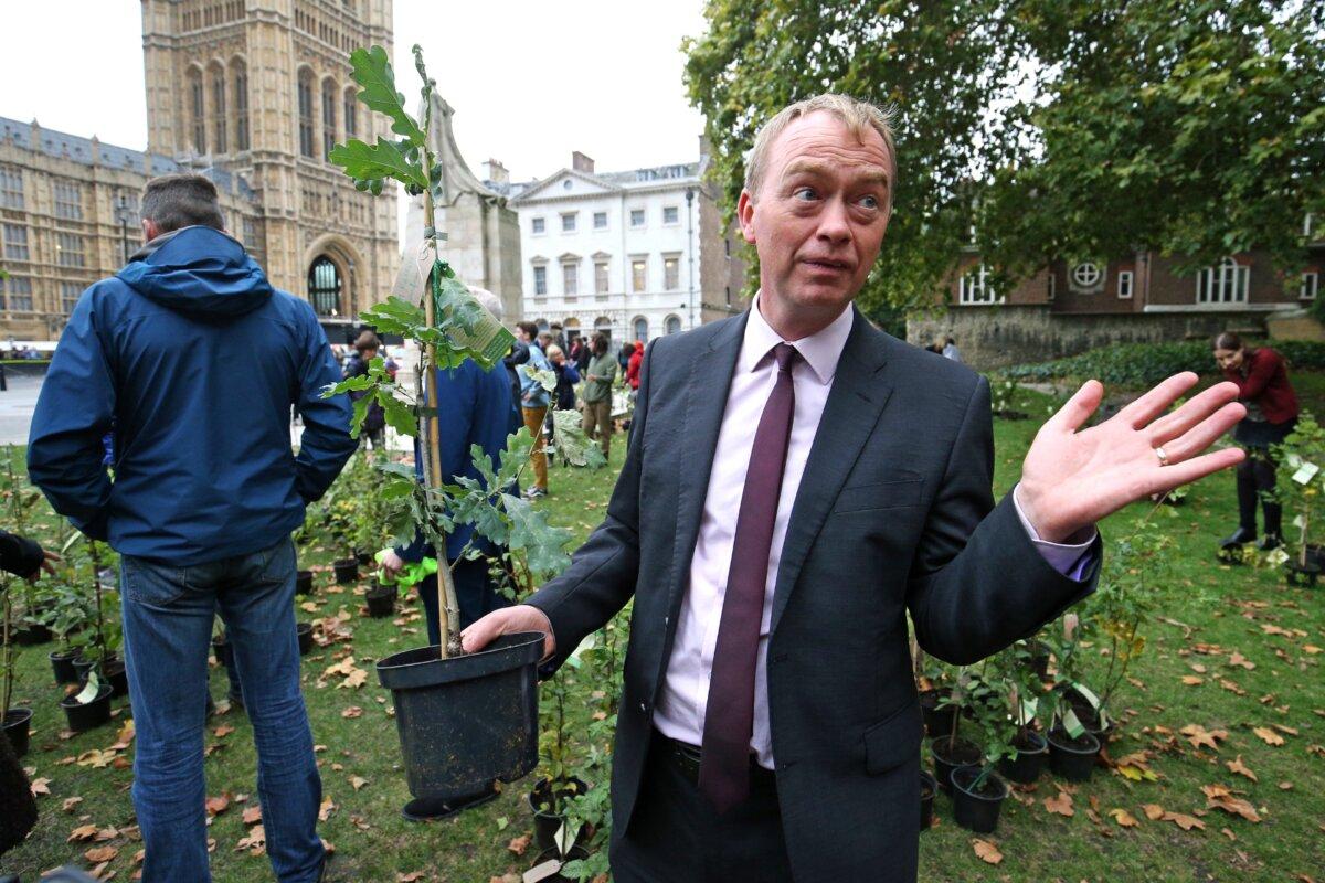 Liberal Democrat MP, Tim Farron, near Old Palace Yard outside Parliament, in London, on Aug. 10, 2023. (Jonathan Brady/PA)