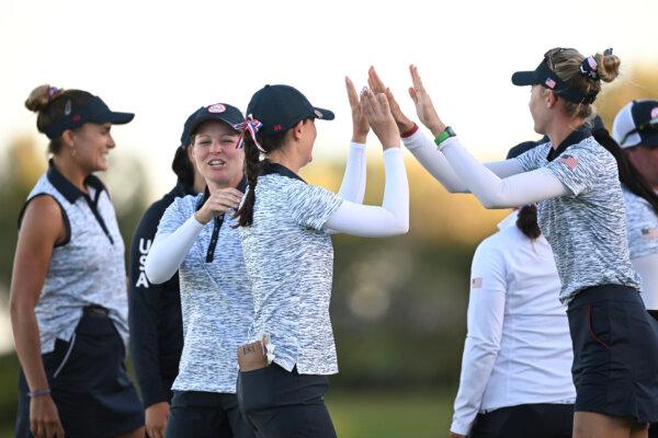  Cheyenne Knight and Nelly Korda of Team USA high five on the 18th hole during Day Two of The Solheim Cup at Finca Cortesin in Casares, Spain, on Sept. 23, 2023. (Stuart Franklin/Getty Images)