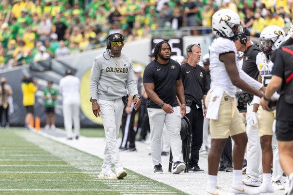  Head coach Deon Sanders of the Colorado Buffaloes walks on the sidelines against the Oregon Ducks during the second half at Autzen Stadium in Eugene, Oregon, on Sept. 23, 2023. (Tom Hauck/Getty Images)